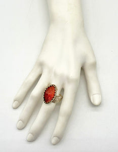 goldstone ring shown on hand