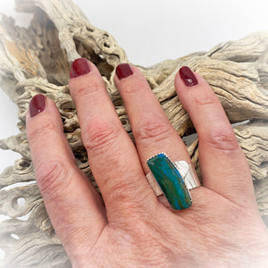 Peruvian opal ring on hand