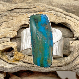 Peruvian opal ring shown in natural setting